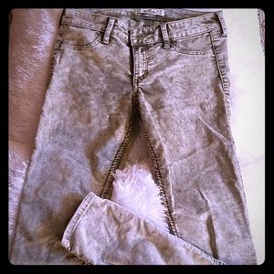 Green acid wash jeans.